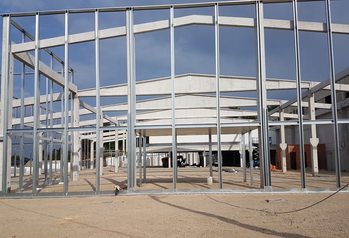 STRUCTURES DE BÉTON PRÉFABRIQUÉES POUR BÂTIMENTS INDUSTRIELS